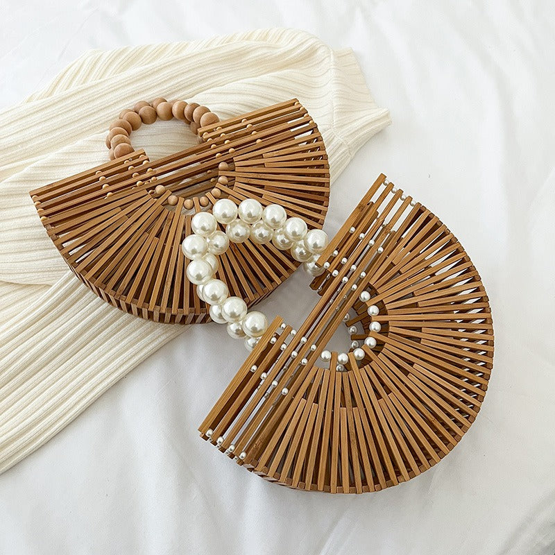 Trendy Handwoven Bamboo Joint Bag! A total game-changer, this Women's New Bamboo Woven Basket Bag screams beach vibes and vacation glam!